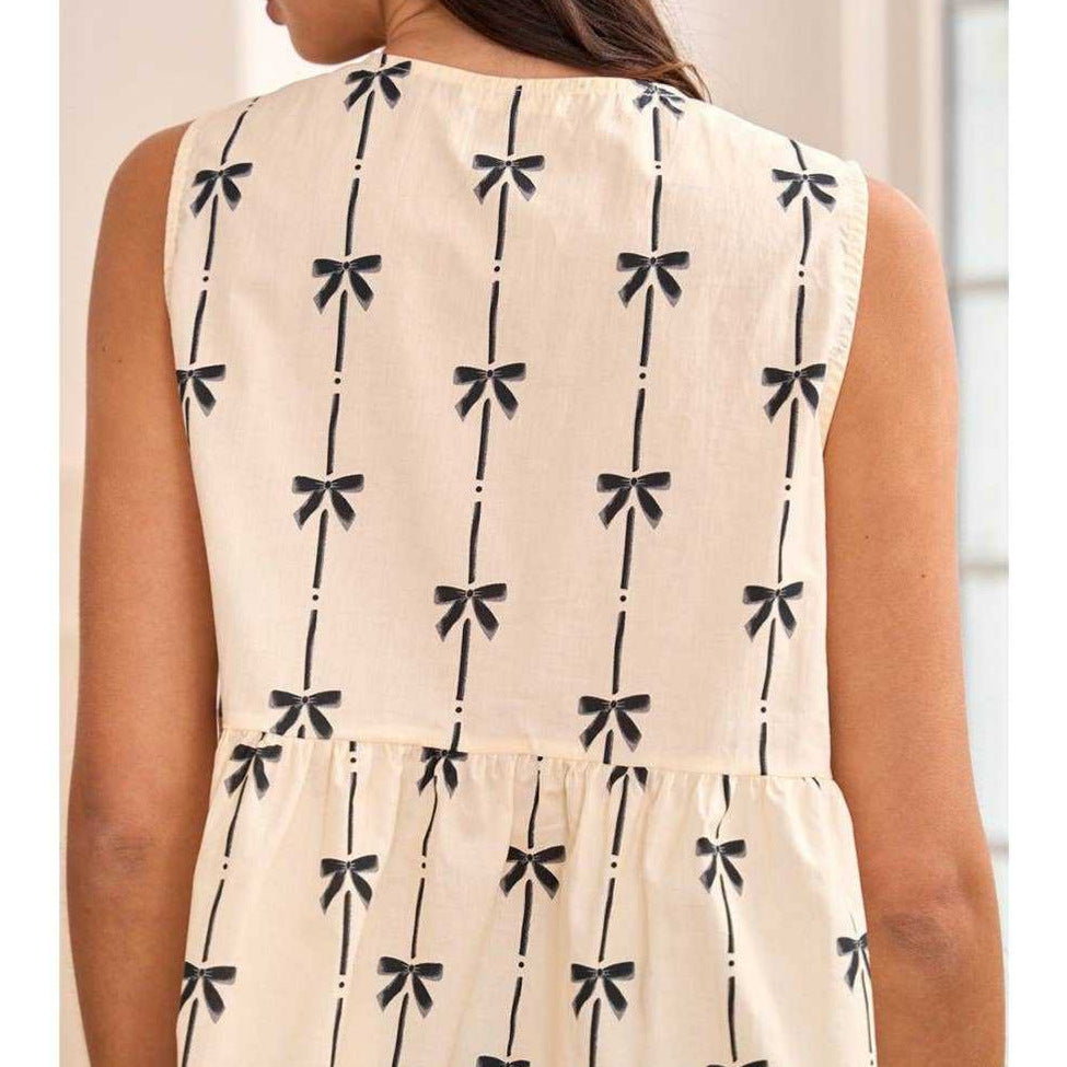Mendi | Mouwloze V-hals Top met Strikdetail – Luchtig & Chic