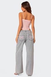 Dahna | Denim Jeans met Wijde Pijpen en Roze Strikdetails