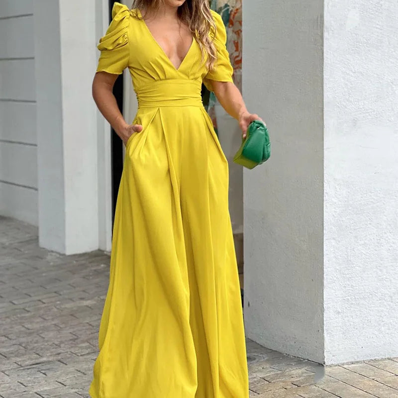 Dames Jumpsuit met Pofmouwen en Tailleband – Elegante Zomerstijl