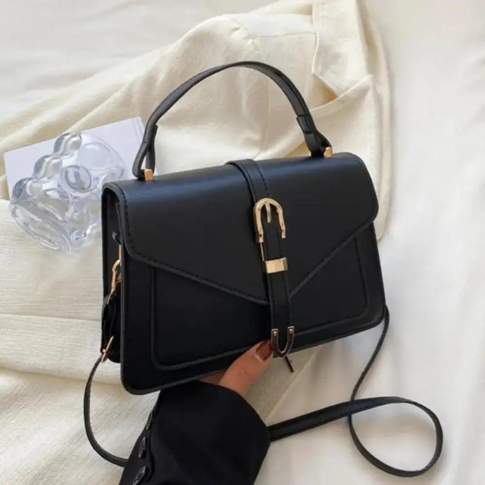 Sorel | Minimalistische Crossbody Tas met Gespsluiting