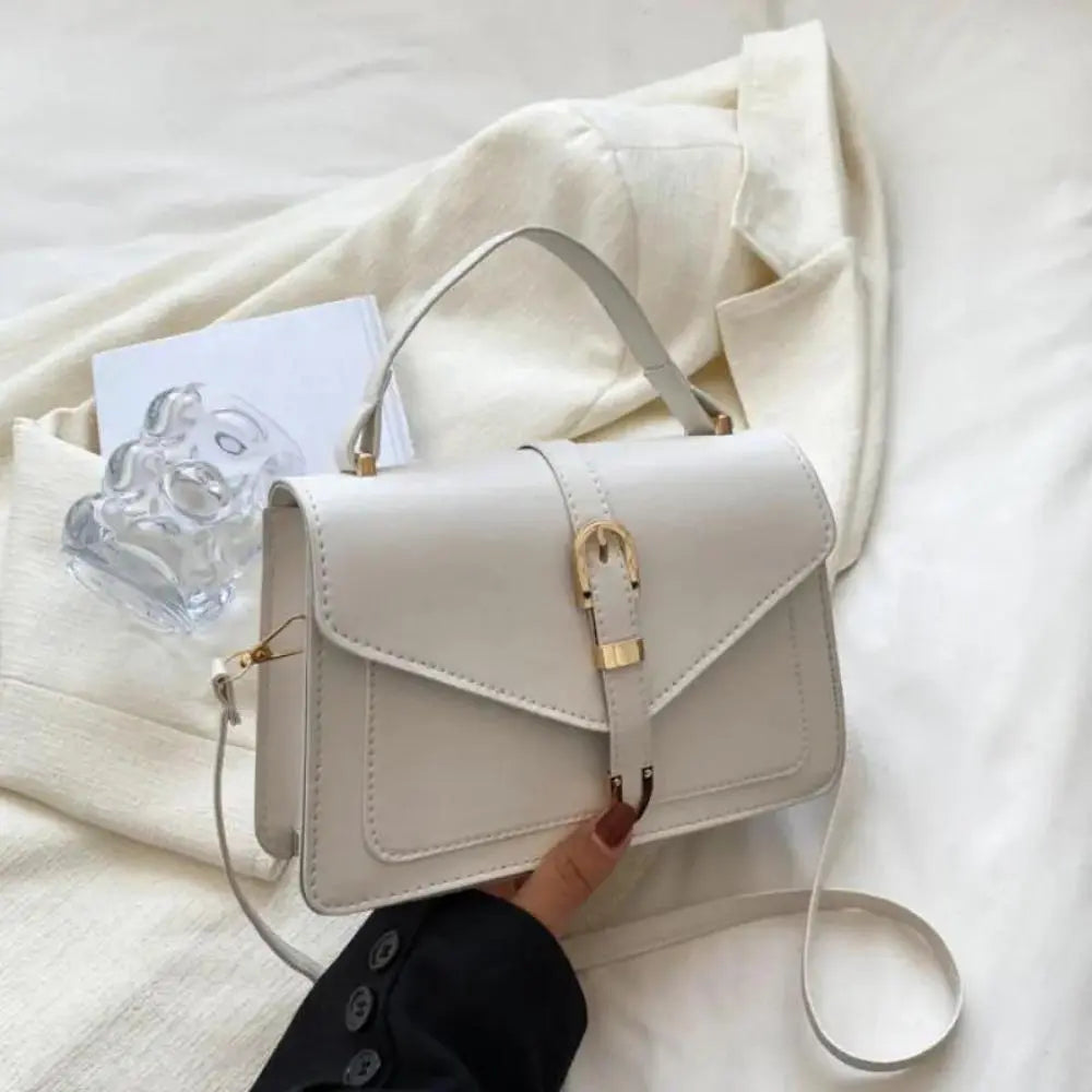 Sorel | Minimalistische Crossbody Tas met Gespsluiting