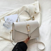 Sorel | Minimalistische Crossbody Tas met Gespsluiting