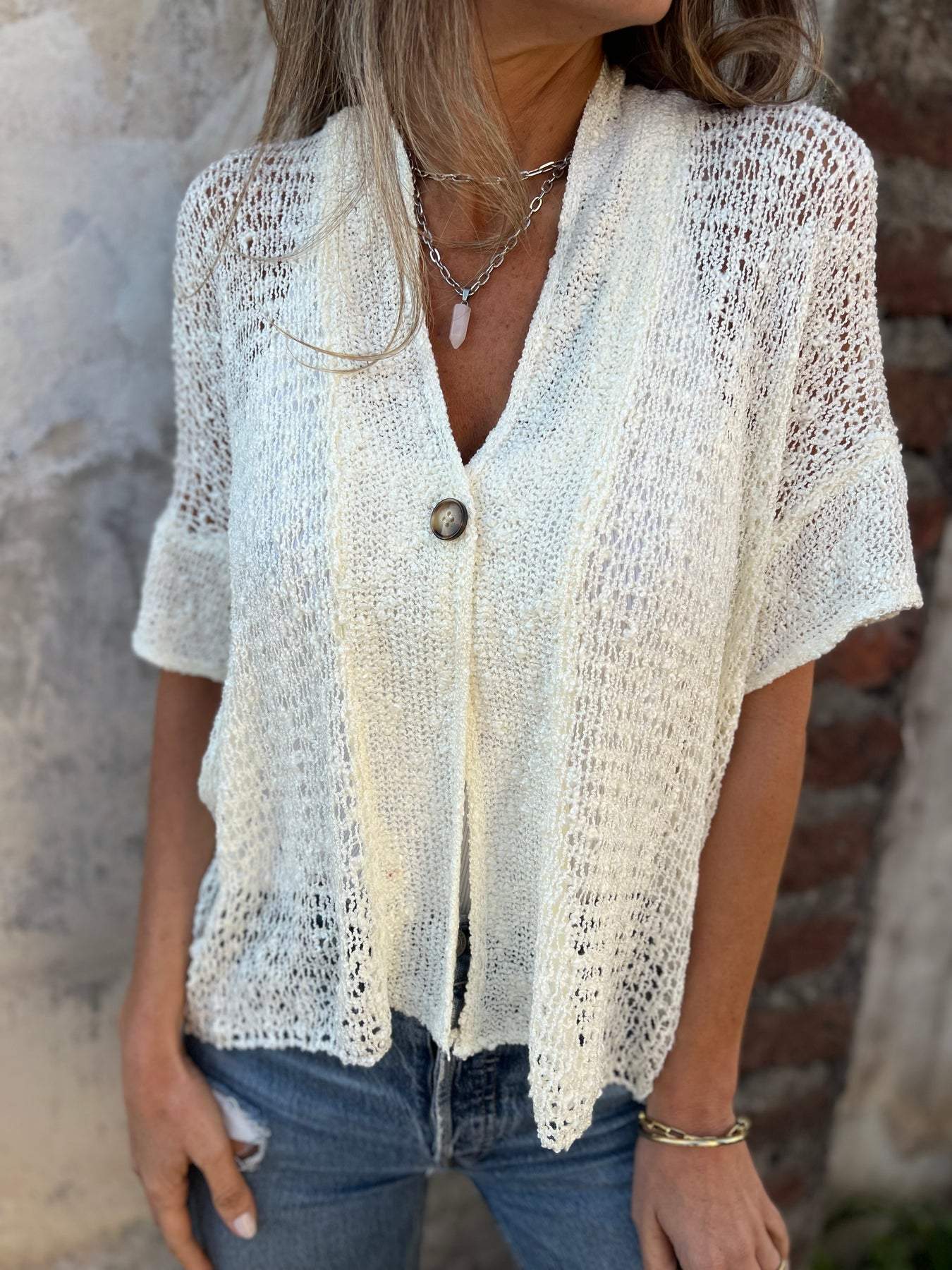 Nena | Gebreide Top met V-hals en Knoop Detail